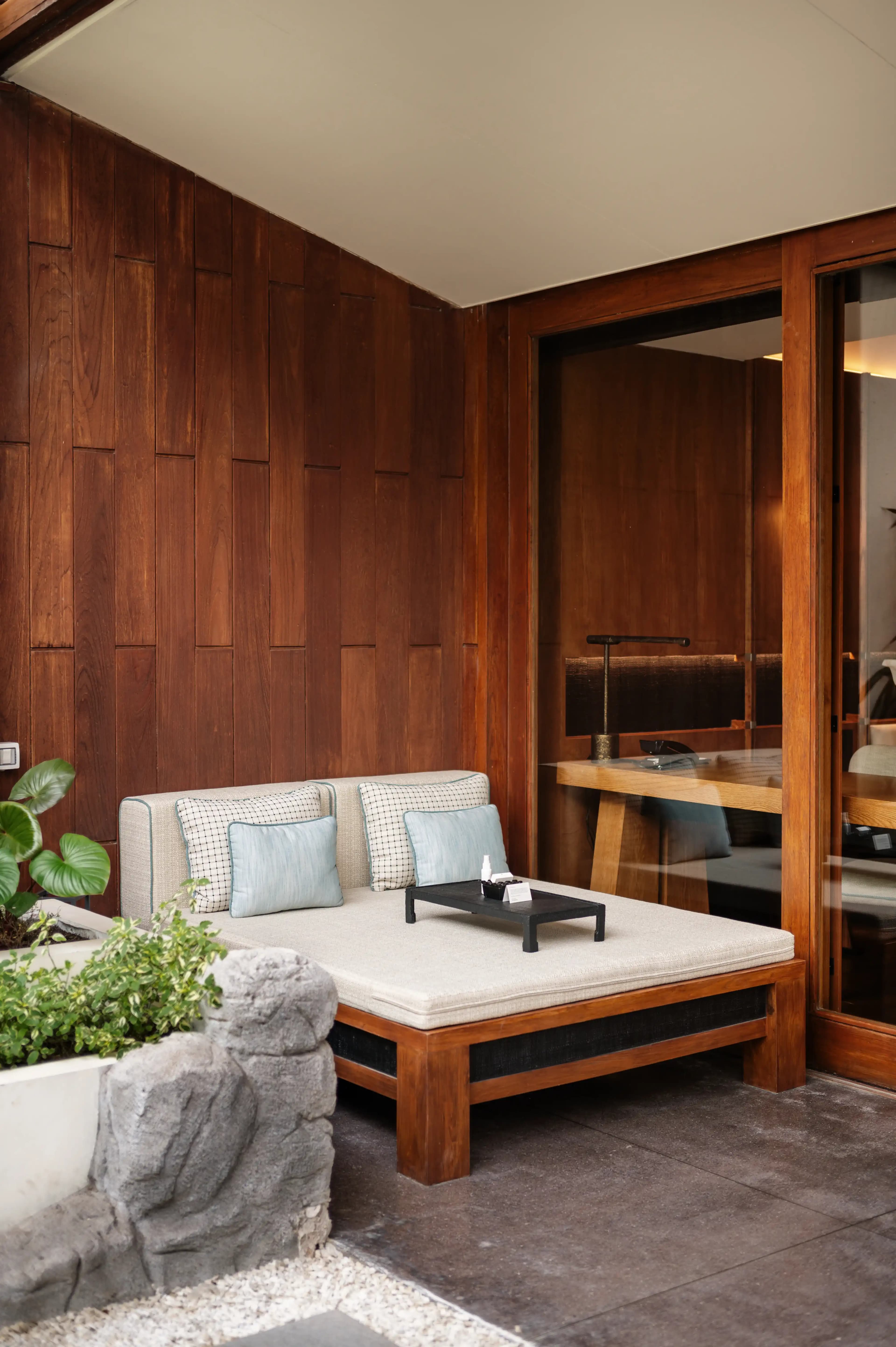 Warm, crafted interior at Anantara Chiang Mai