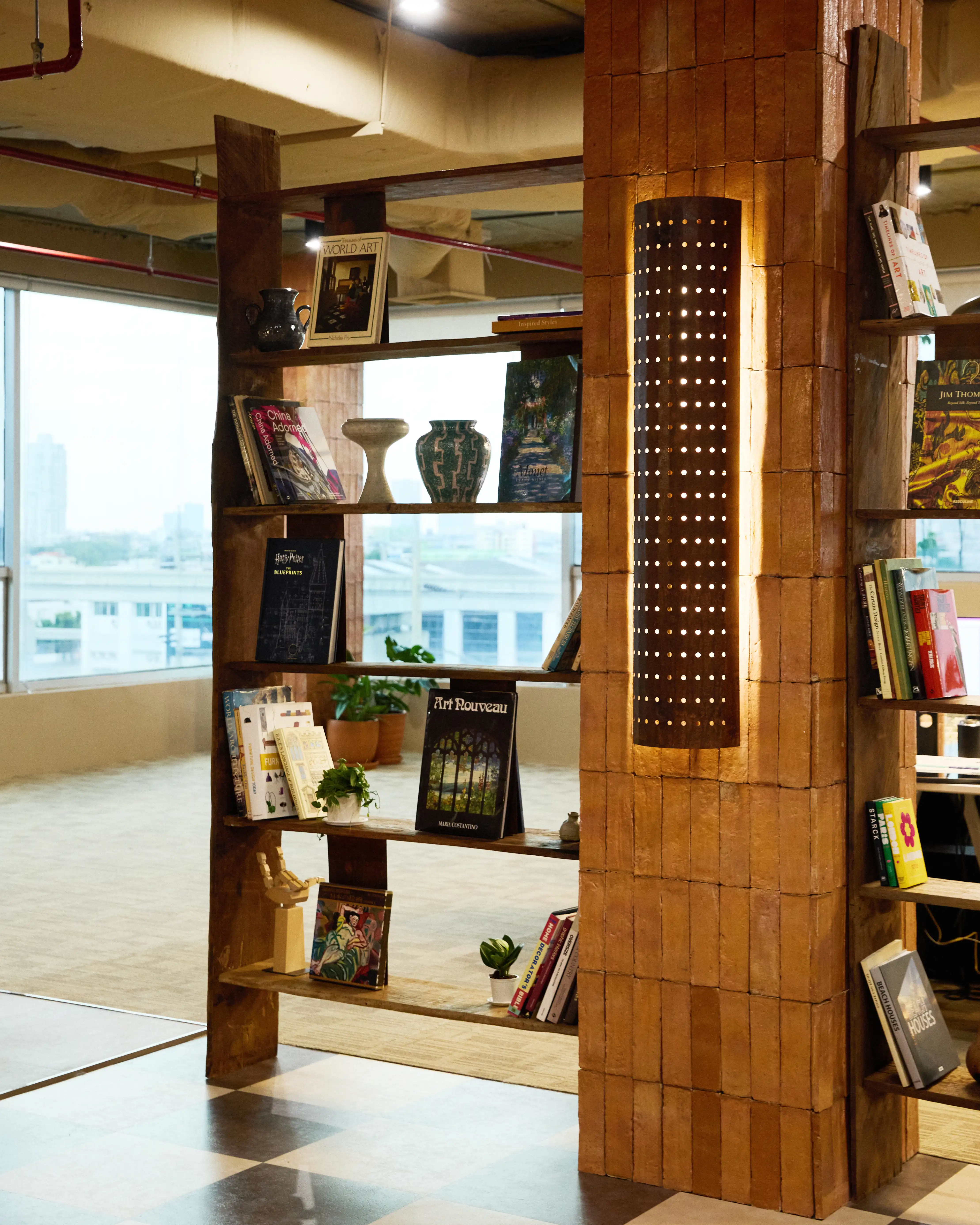 Bookshelf pillar detail with lamp fixture