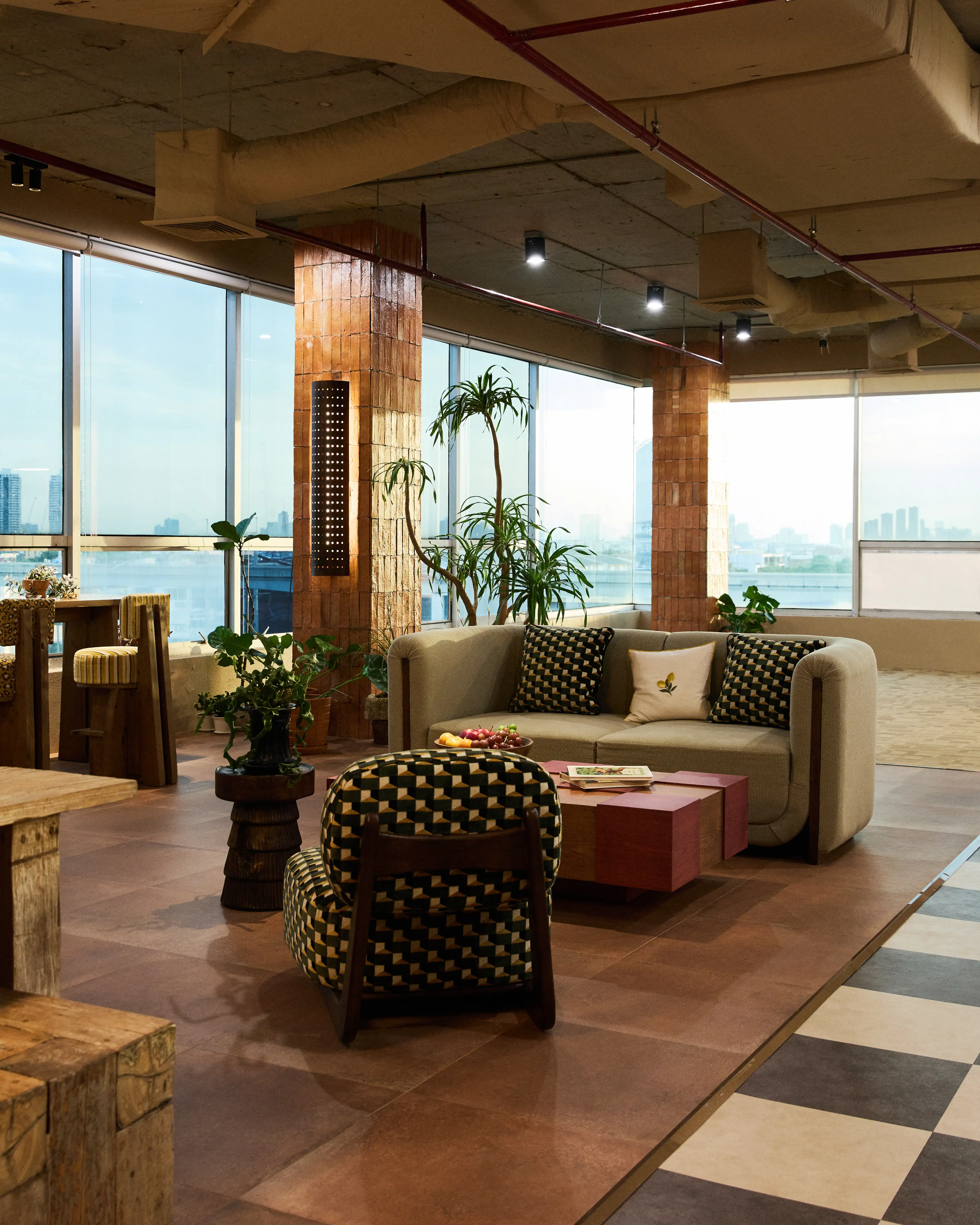 SIWA studio lounge area with green armchair